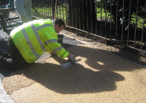 Trowelling resin gravel path